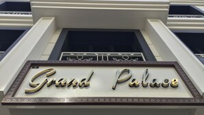 A building with a sign that reads "Grand Palace." - Grand Palace Hotel (Istanbul)