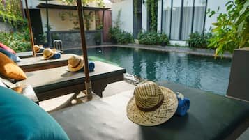 Outdoor pool, pool umbrellas, pool loungers