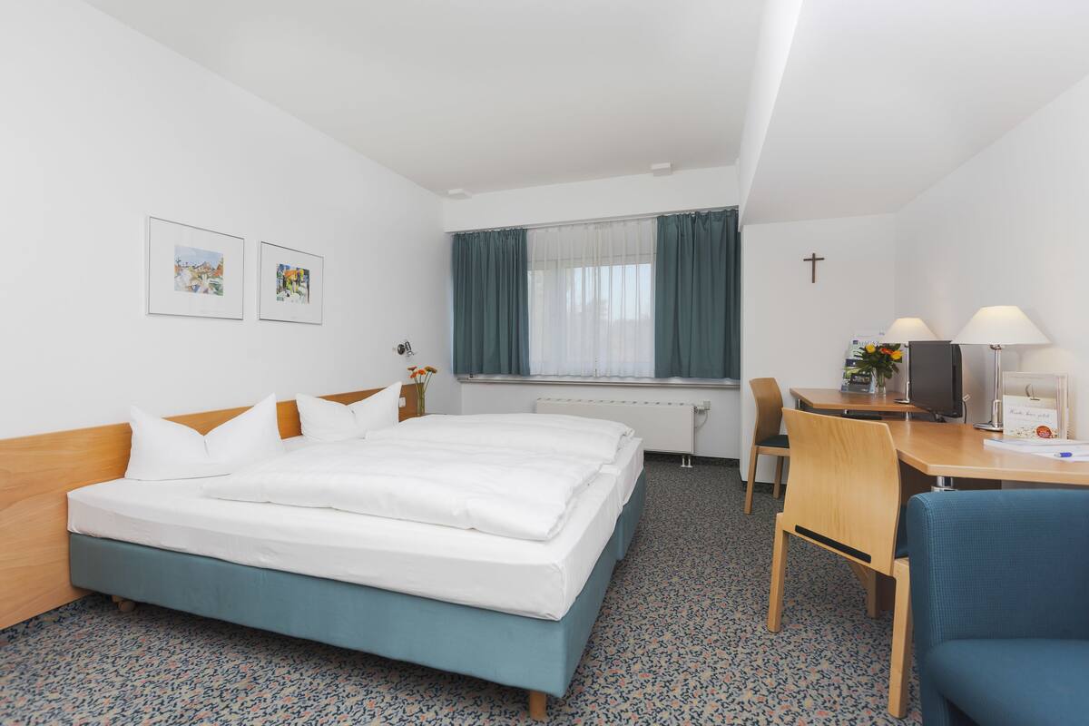 Comfort Double or Twin Room, Courtyard View | In-room safe, desk, soundproofing, iron/ironing board