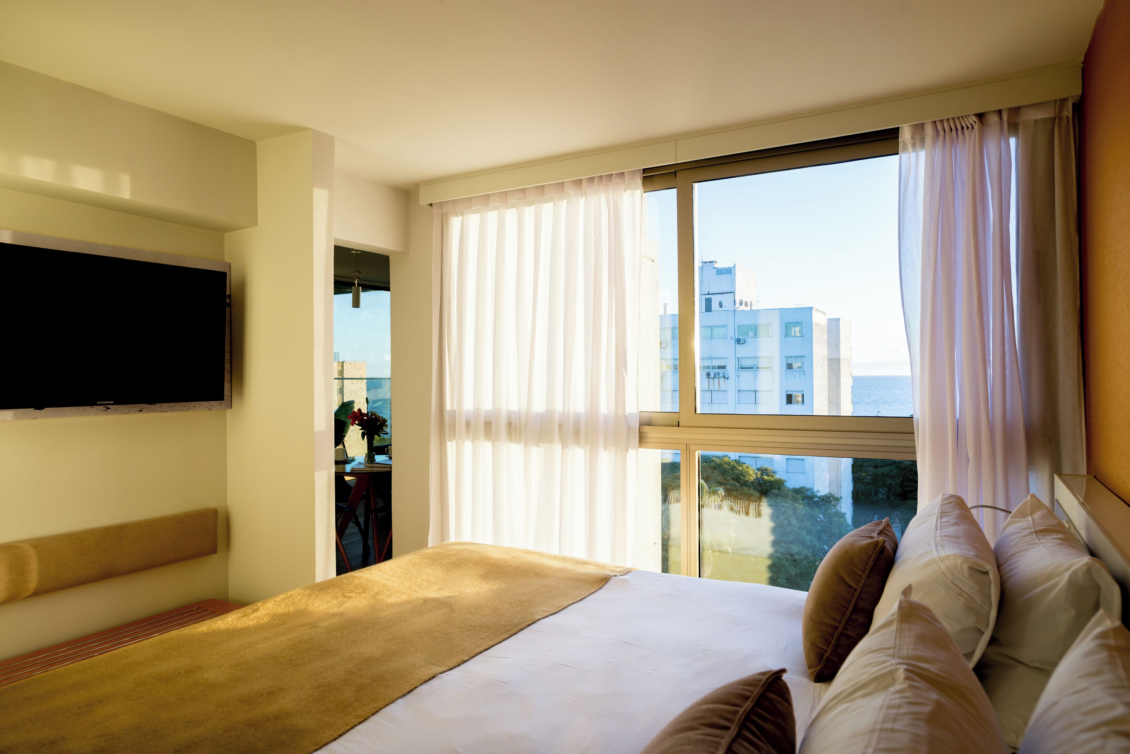 Habitación senior | Ropa de cama de alta calidad y minibar 