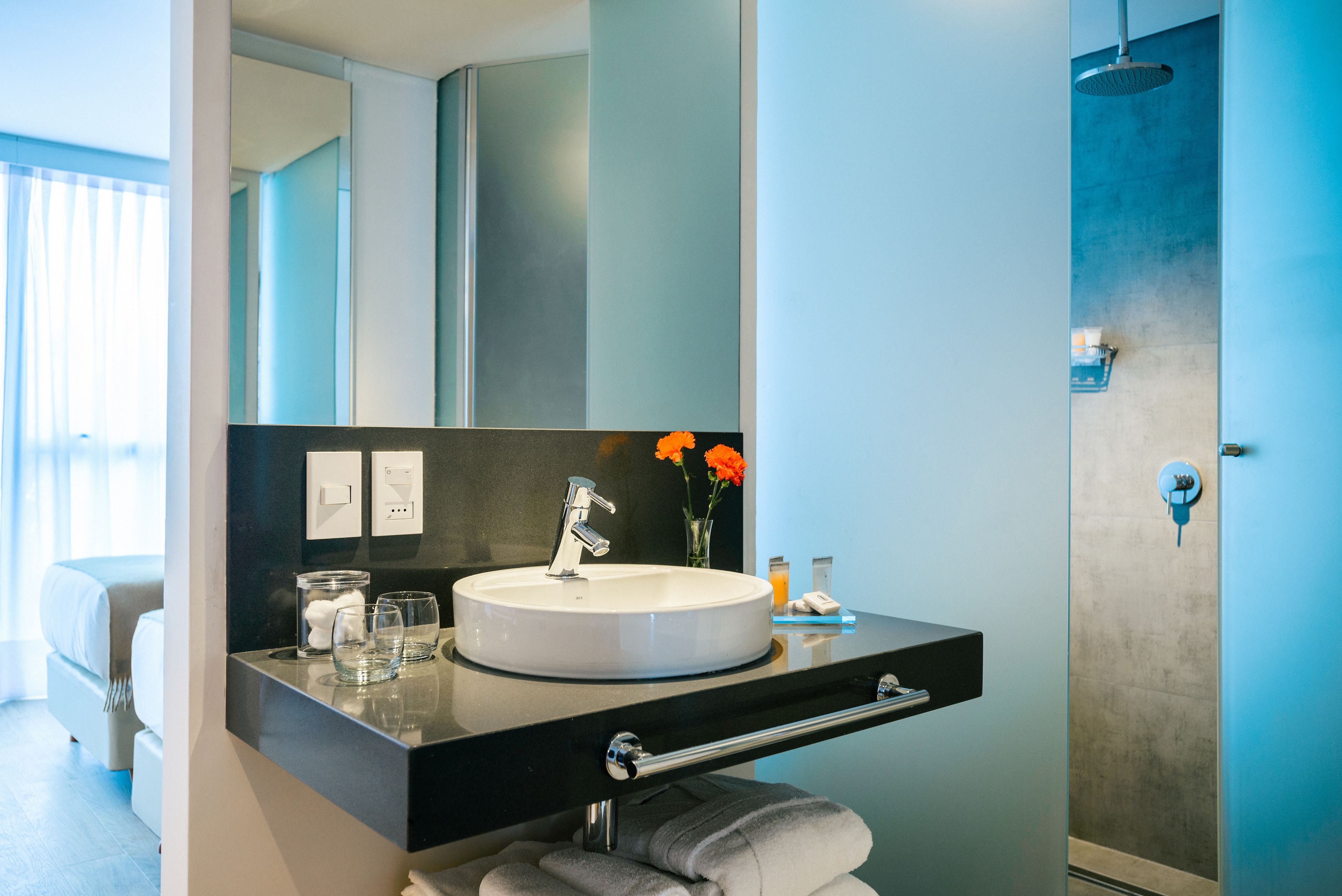 shower, designer toiletries, hair dryer, bathrobes