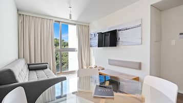 Deluxe Suite, 1 King Bed | Premium bedding, minibar, in-room safe, desk