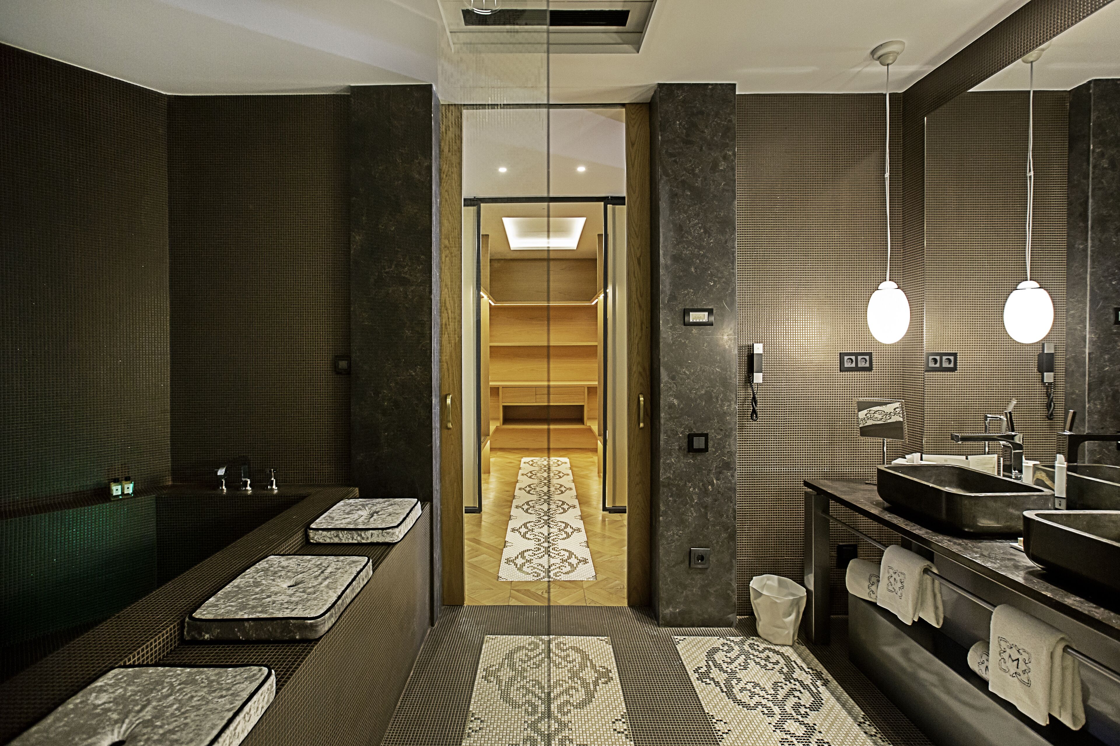 designer toiletries, hair dryer, bathrobes, slippers