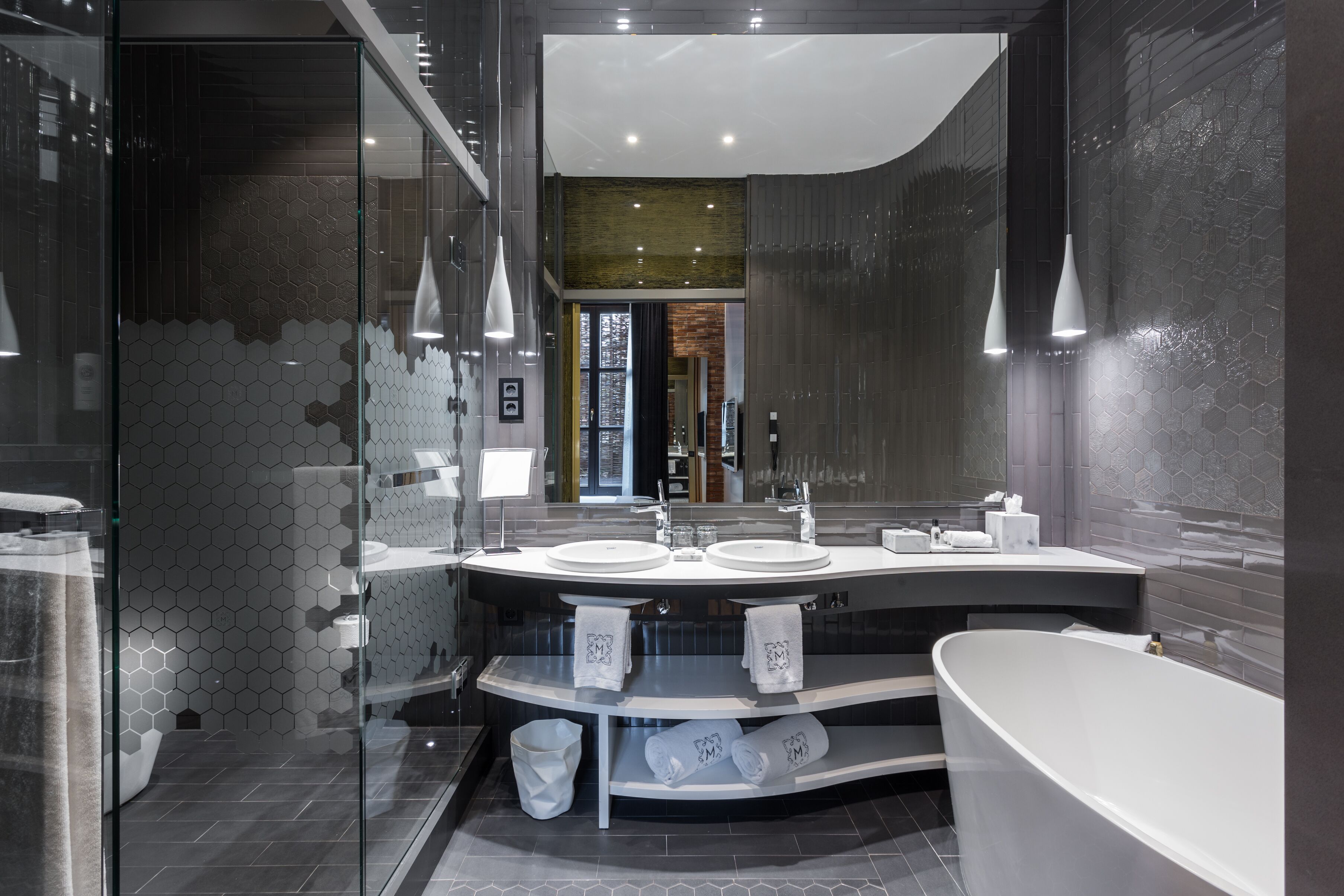 junior suite patio | bathroom | designer toiletries, hair dryer, bathrobes, slippers