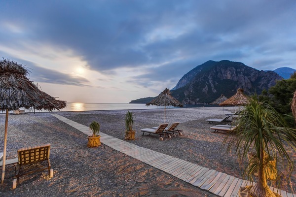 Een privéstrand, een gratis shuttleservice van/naar het strand