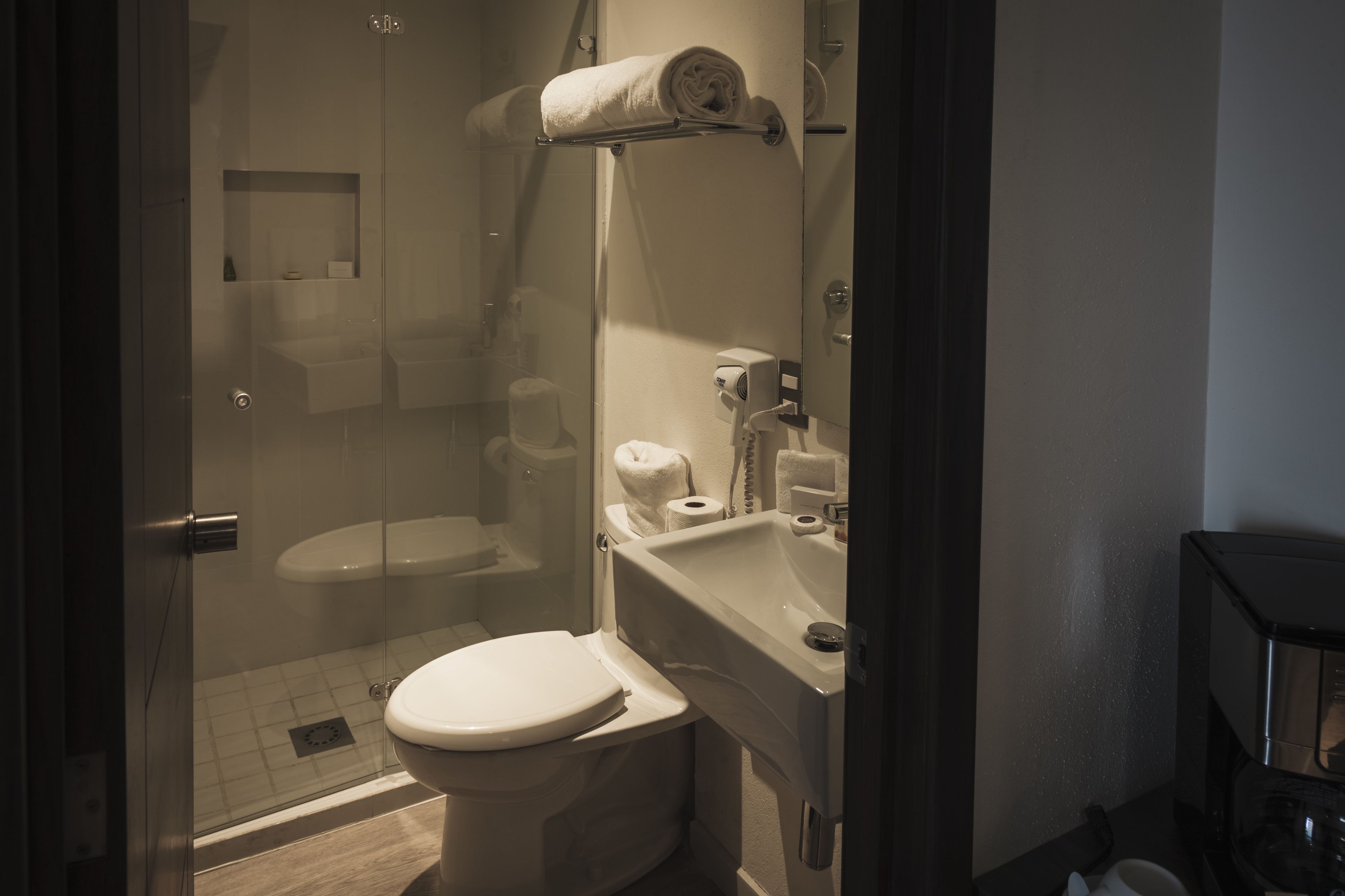 deluxe room, 1 king bed | bathroom | shower, free toiletries, hair dryer, towels