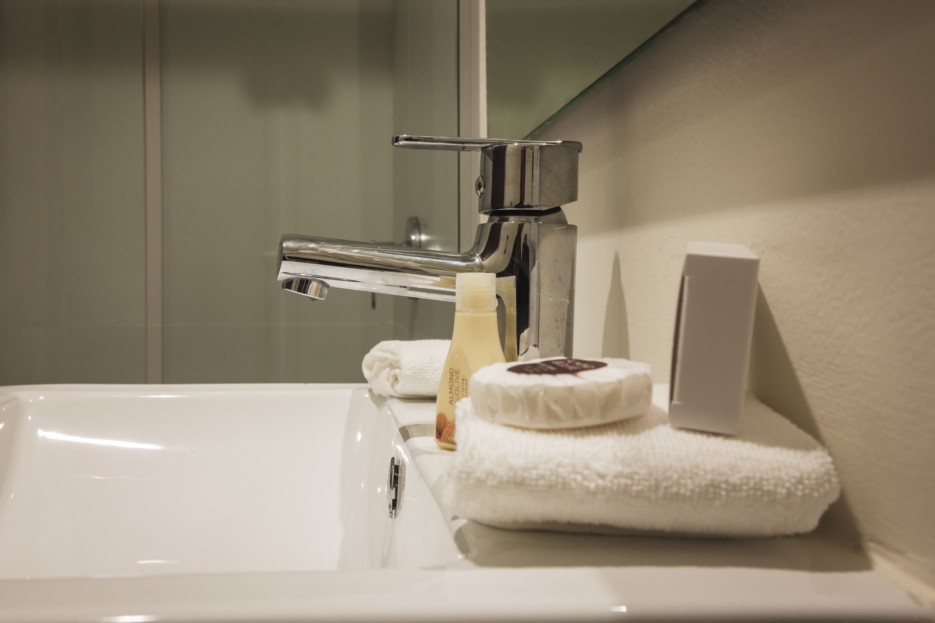 deluxe room, 1 king bed | bathroom sink