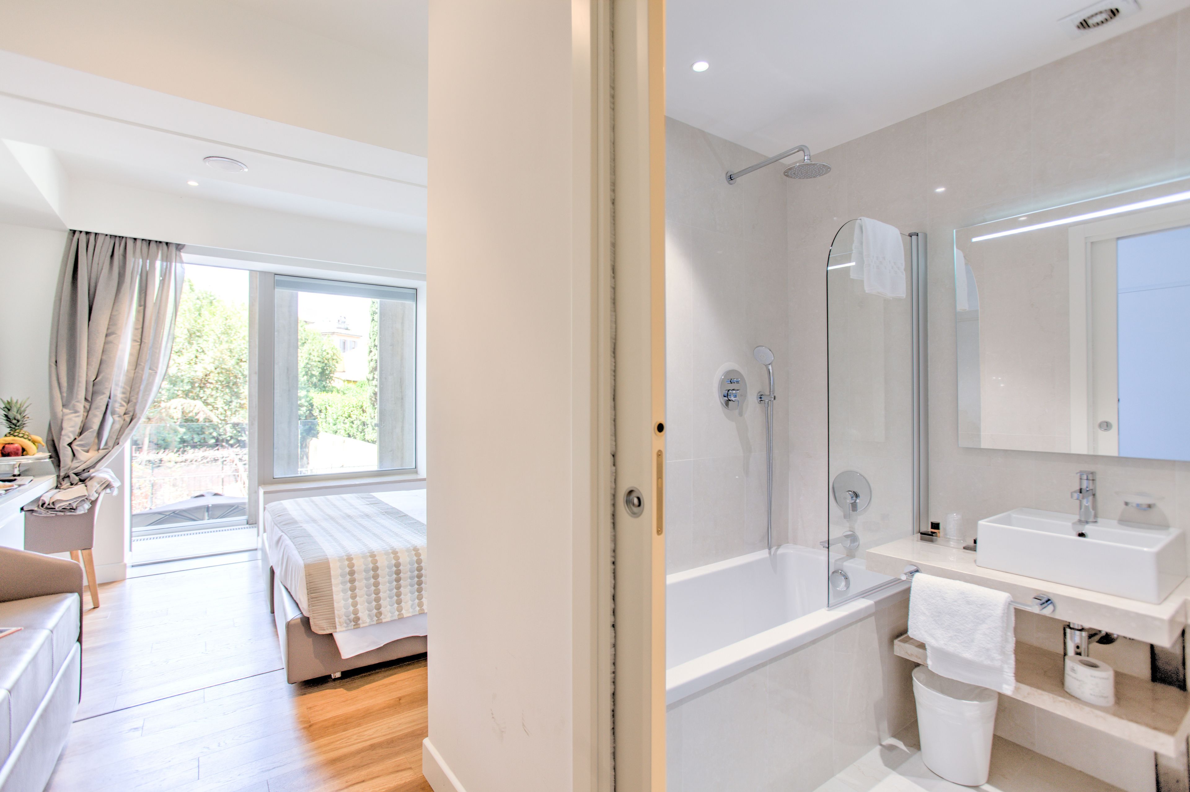 family double room | minibar, in-room safe, desk, blackout curtains