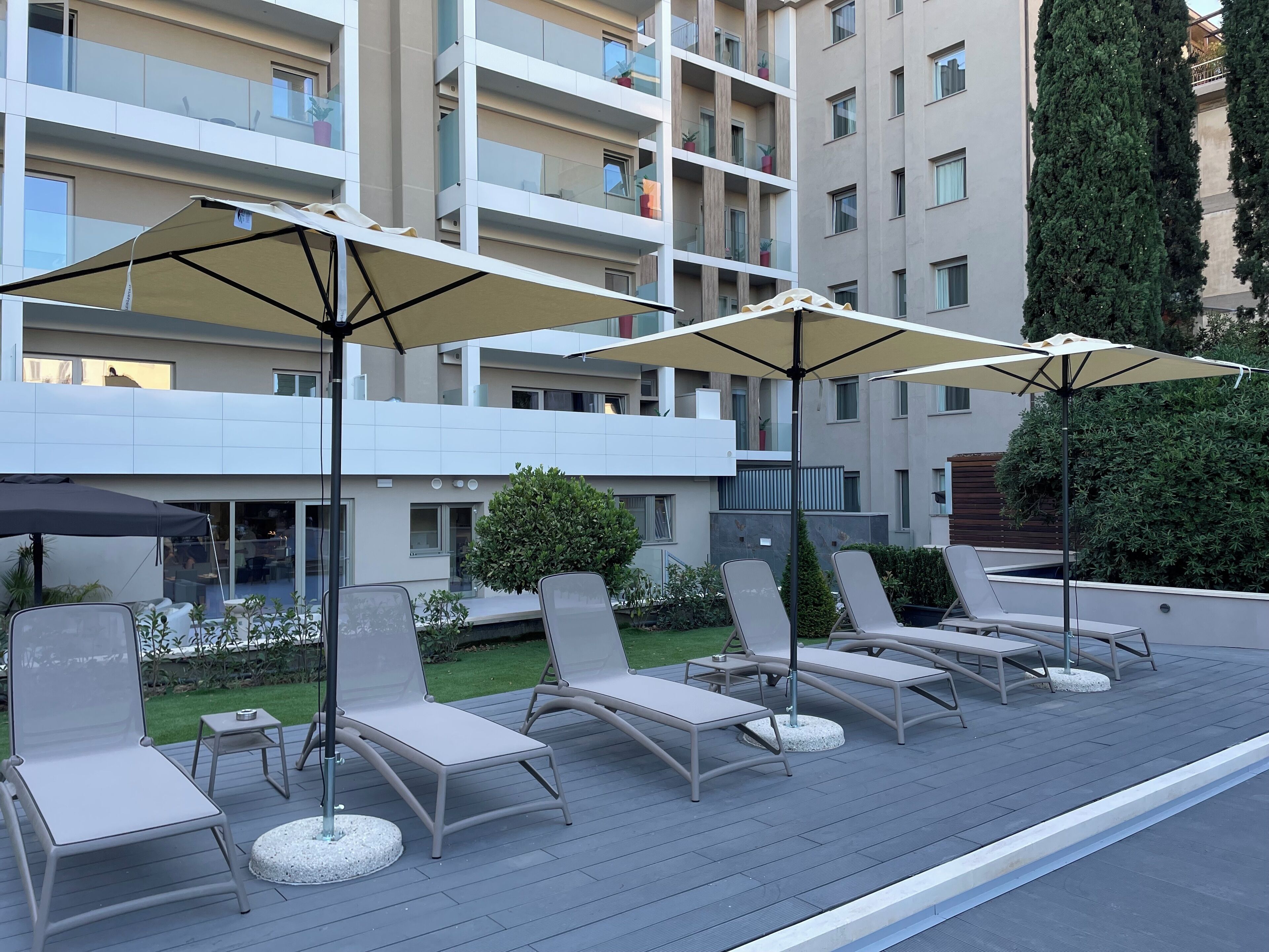 indoor pool, seasonal outdoor pool, pool umbrellas, pool loungers