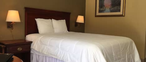 Habitación Deluxe, 1 cama Queen size | Escritorio, insonorización, wifi gratis y ropa de cama