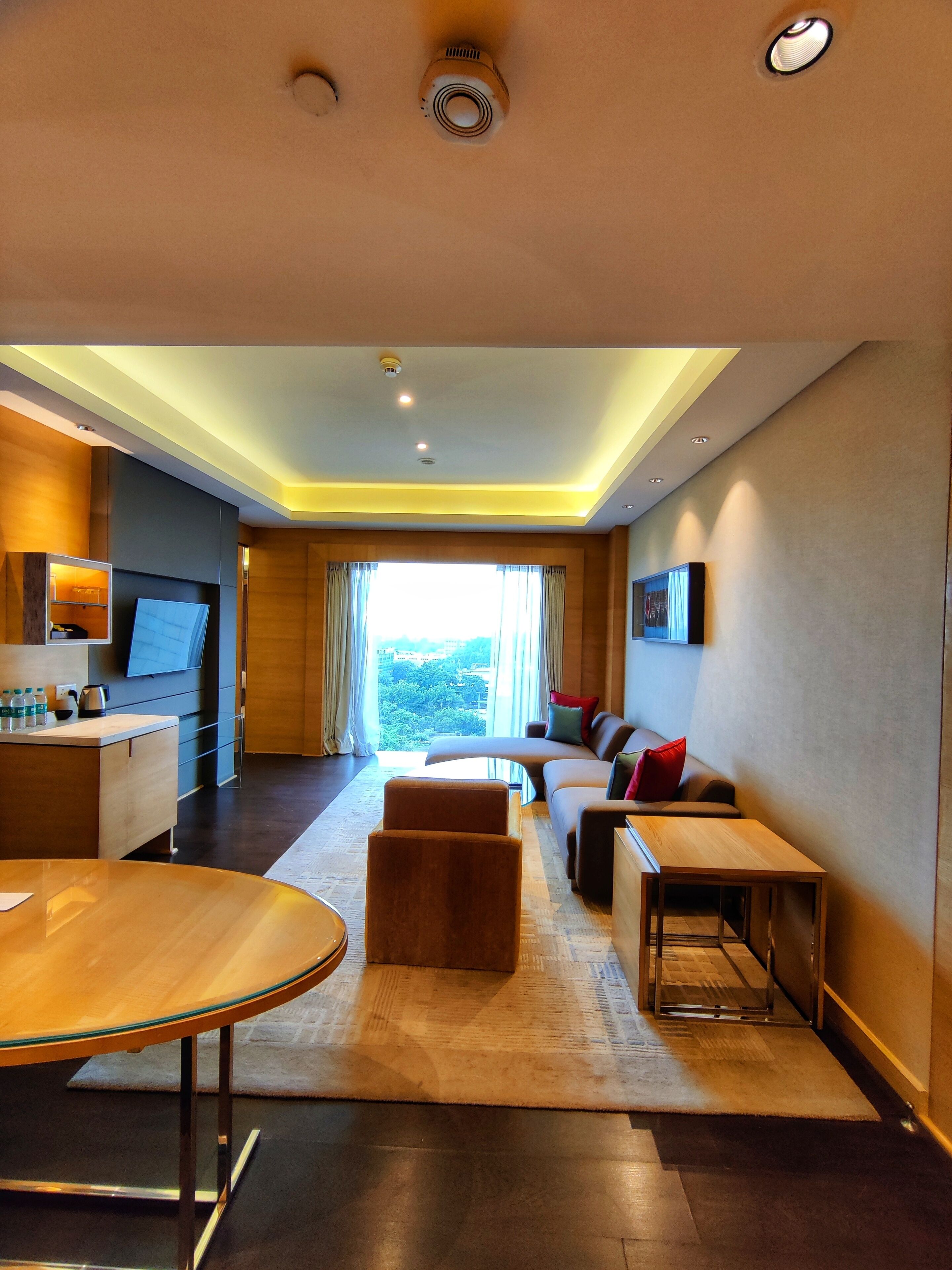 suite (regency suite) | living area | 42-inch led tv with cable channels, tv, ipod dock
