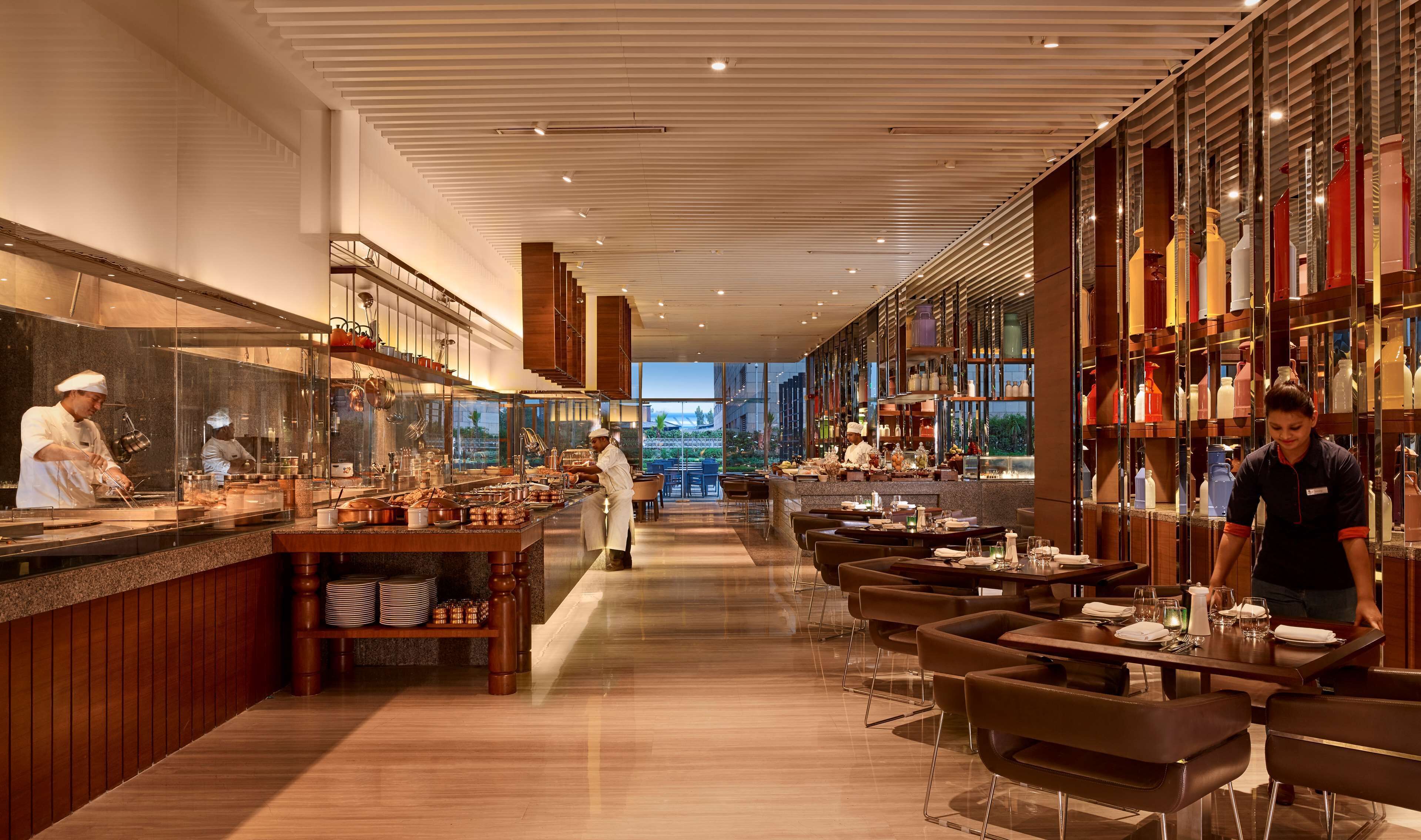 5 restaurants, breakfast, lunch, dinner served; Indian cuisine 