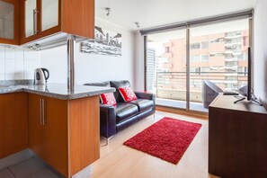 Executive Apartment, 1 Bedroom | Living room | 40-inch LCD TV with cable channels, TV - Livinnest Apartments (Santiago)