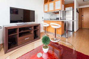 40-inch LCD TV with cable channels, TV - Livinnest Apartments (Santiago)