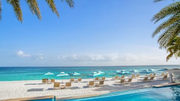 On the beach, white sand, windsurfing, beach bar