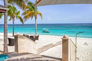 On the beach, white sand, windsurfing, beach bar