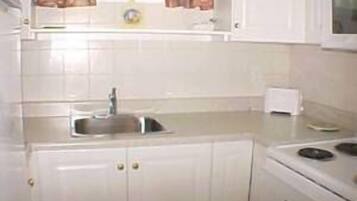 Cottage, 2 Bedrooms | Private kitchen | Full-sized fridge, microwave, stovetop, coffee/tea maker