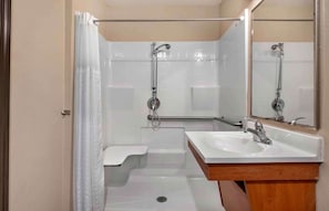 Combined shower/tub, hair dryer, towels, soap