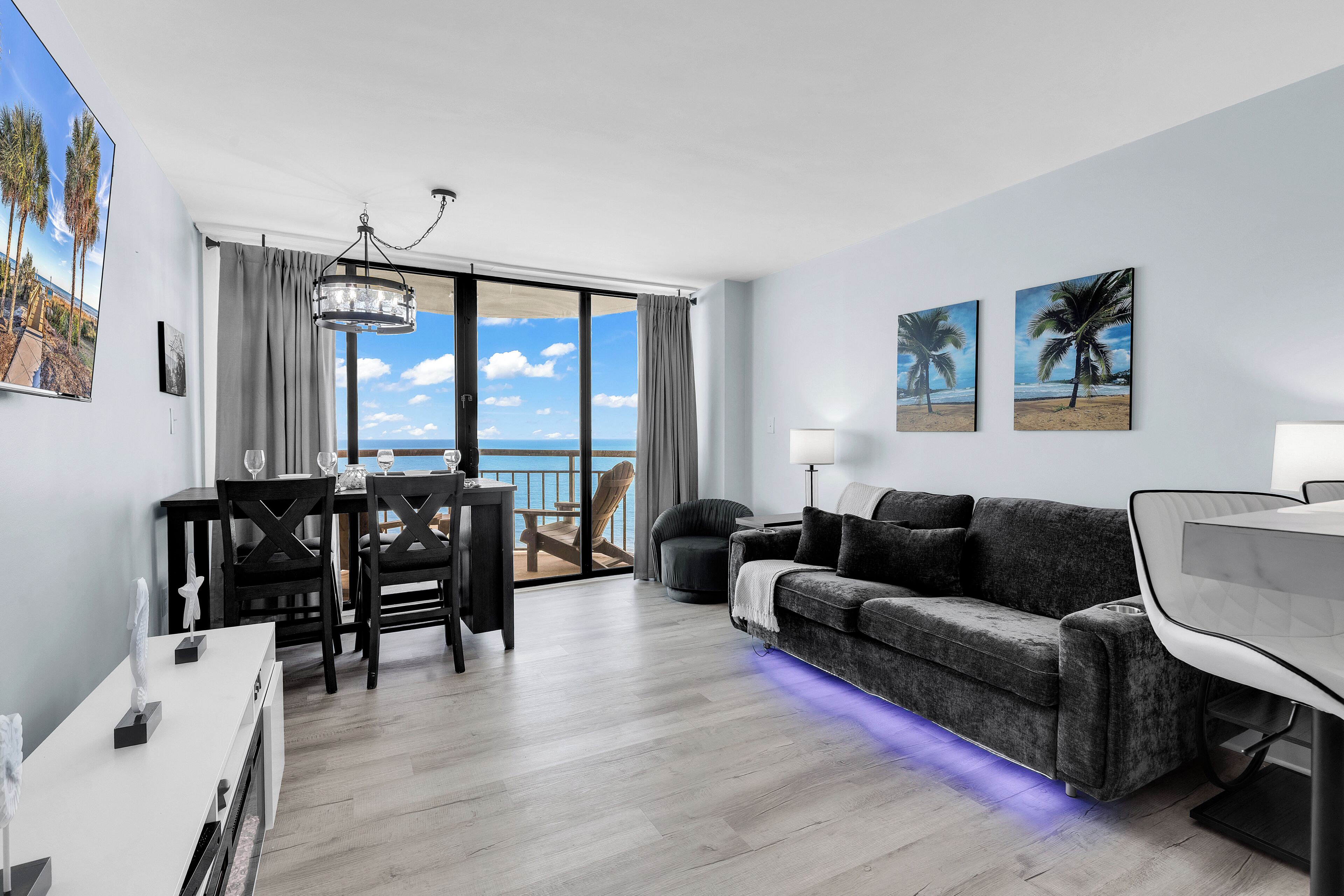 Comfort Condo, 1 Bedroom, Balcony, Oceanfront | Living room | 55-inch flat-screen TV with cable channels, TV