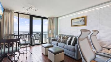 Premium Condo, 1 Bedroom, Balcony, Oceanfront | Living room | 55-inch flat-screen TV with cable channels, TV