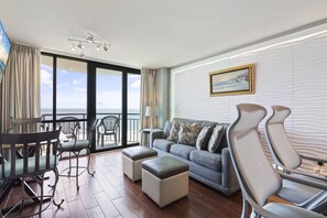 Premium Condo, 1 Bedroom, Balcony, Oceanfront | Living room | 55-inch flat-screen TV with cable channels, TV
