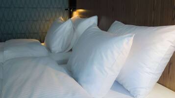 Premium bedding, memory foam beds, minibar, in-room safe