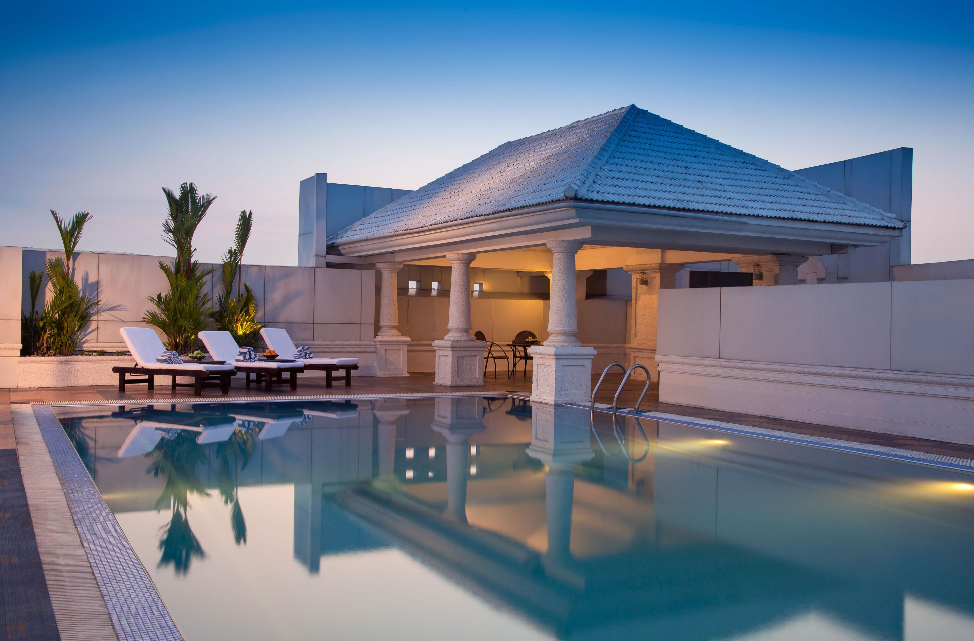 Indoor pool, open 6:00 AM to 8:00 PM, pool umbrellas