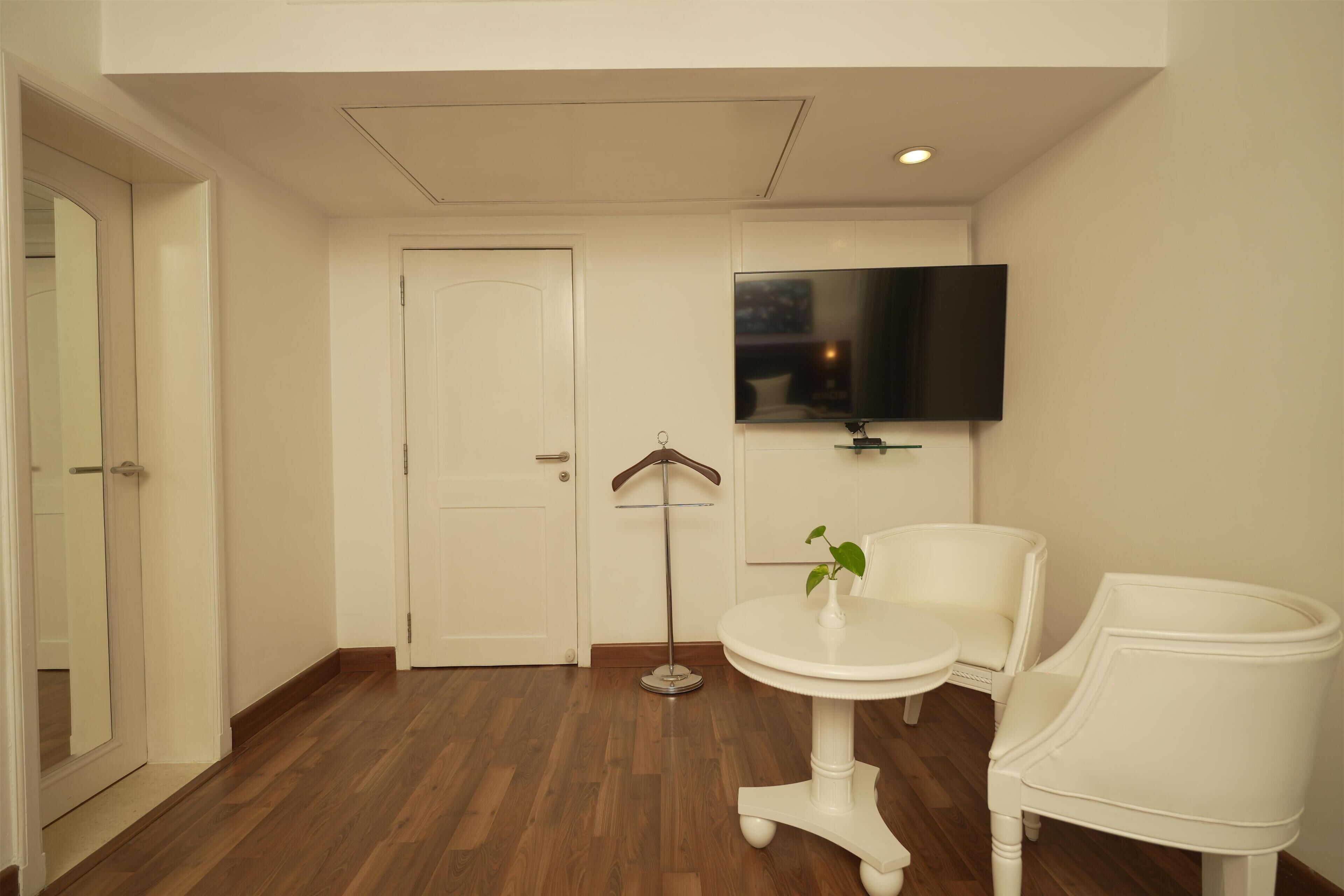 Suite Deluxe | Ropa de cama de alta calidad, minibar, caja fuerte y escritorio