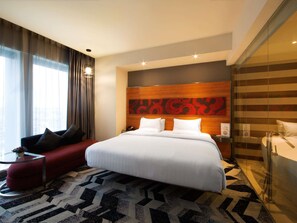 Suite Junior, 1 Tempat Tidur King | Minibar, brankas, meja kerja, dan kedap suara