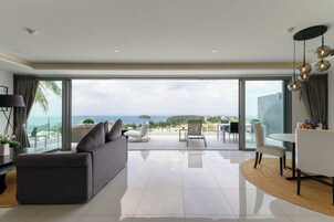 Deluxe Apartment, 2 Bedrooms, Sea View | Living room | 55-inch Smart TV with satellite channels, TV, Netflix