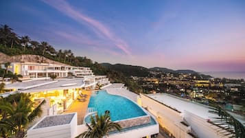 Relax by the expansive pool surrounded by stunning views of the coastline and landscape.