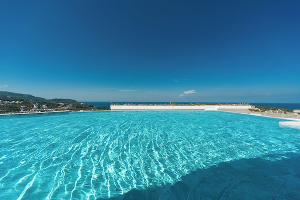 Indoor pool, outdoor pool, open 8:00 AM to 9:00 PM, pool umbrellas