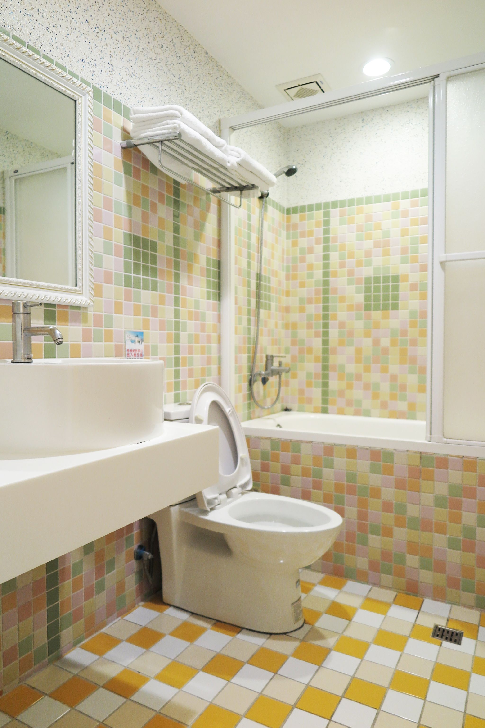 quadruple room, no windows (305) | bathroom | free toiletries, hair dryer, slippers