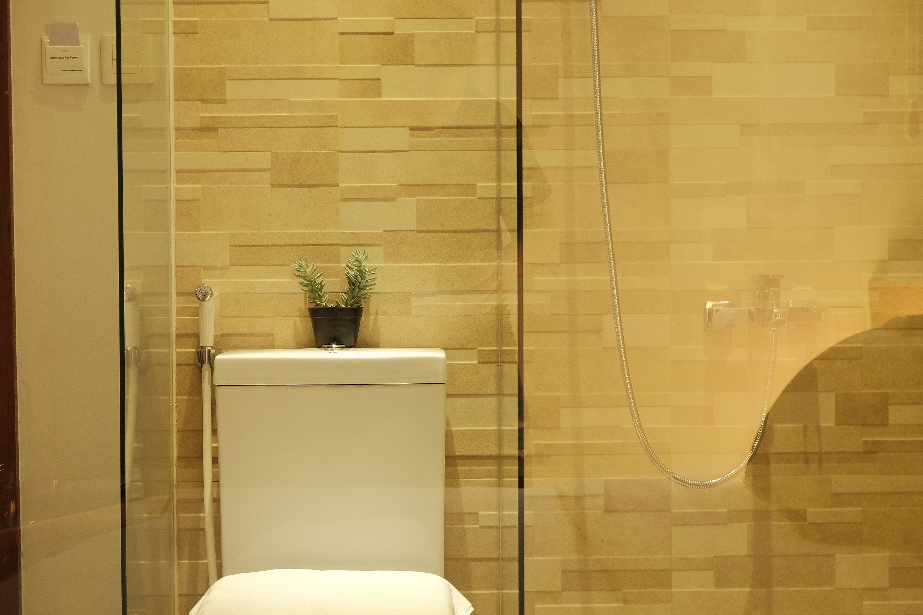 standard room | bathroom | shower, free toiletries, hair dryer, slippers