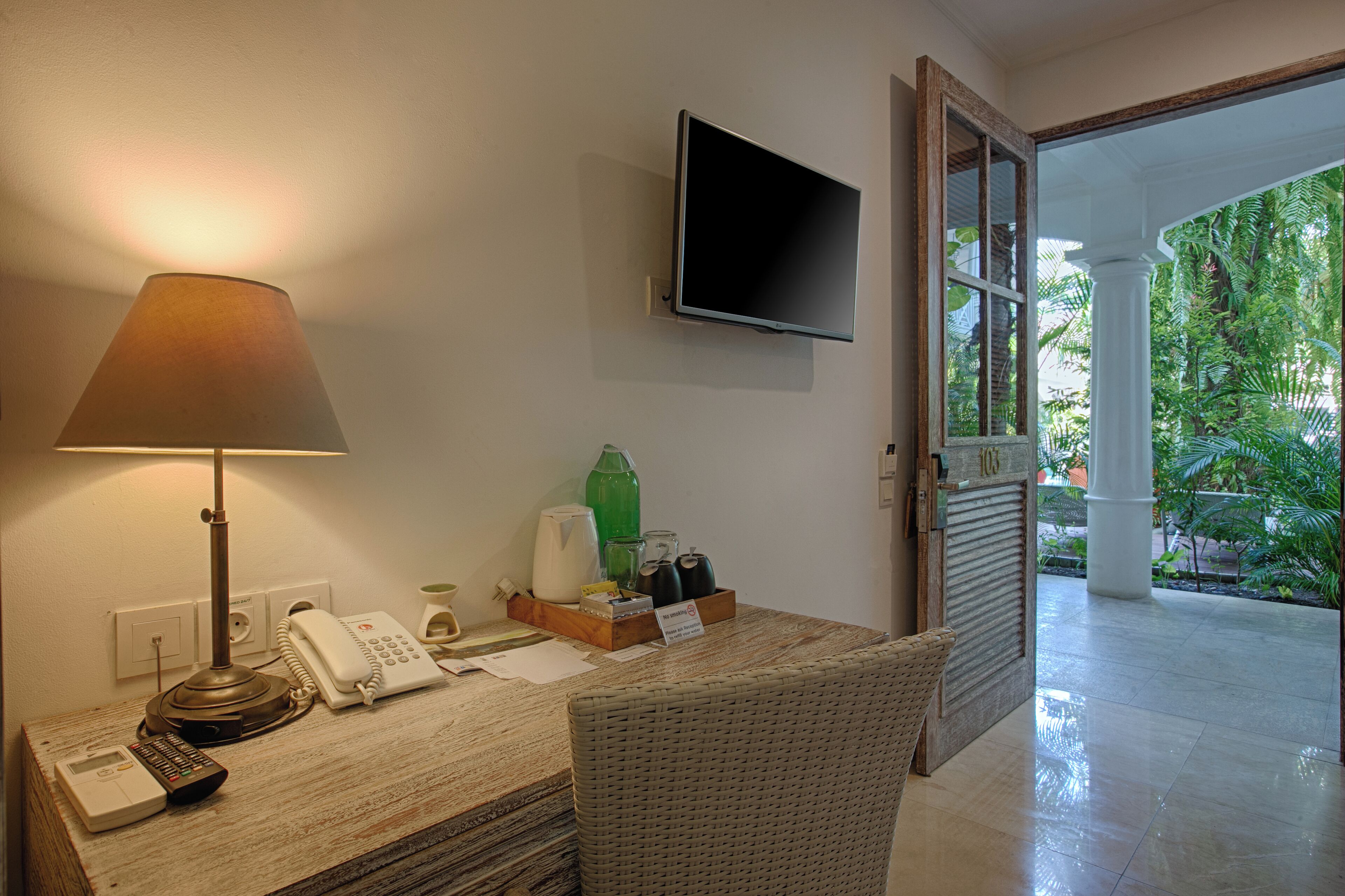 nudibranch disabled twin room (pool view) | minibar, in-room safe, desk, free wifi