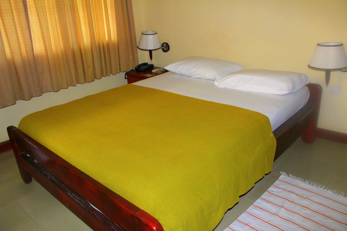 Economy Double Room | In-room safe, free WiFi, bed sheets