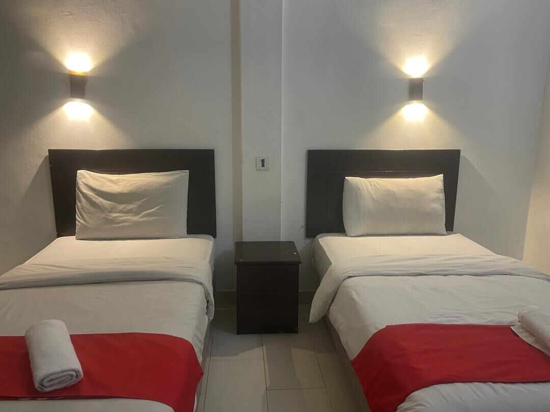 Twin Room | Laptop workspace, iron/ironing board, free WiFi, bed sheets