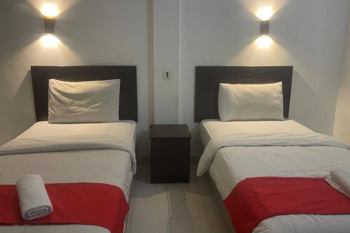 Twin Room | Laptop workspace, iron/ironing board (on request), WiFi (free)