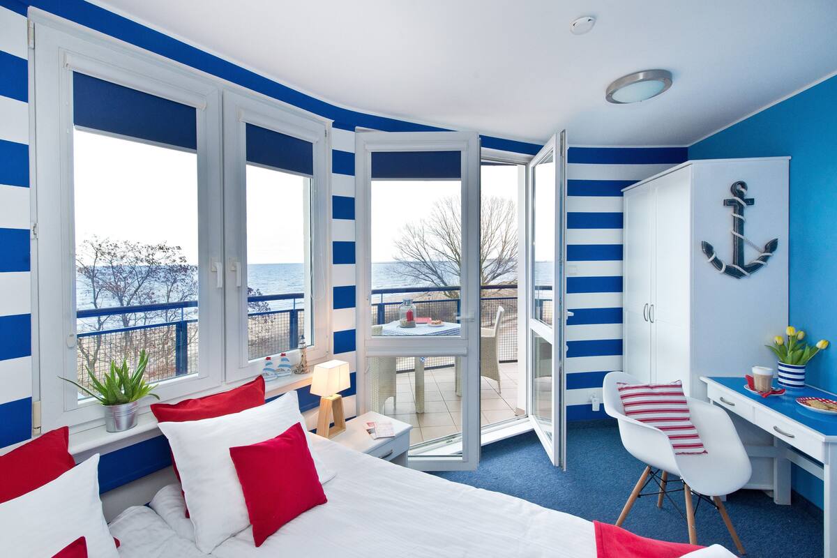 Desk, blackout curtains, iron/ironing board, free cots/infant beds