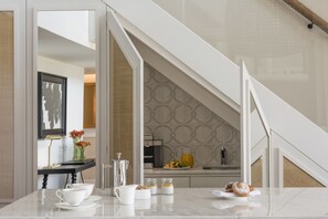 Premium bedding, down comforters, minibar, in-room safe