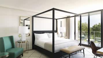 Luxe beddengoed, donzen dekbedden, een minibar, een kluis op de kamer