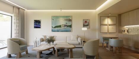 Un salon moderne comprenant un canapé, des fauteuils, une table basse et un coin repas. Les murs sont ornés de tableaux, et il y a un coin cuisine avec un comptoir et une lampe.