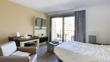 Standard Apartment, Balcony | Living area | Flat-screen TV