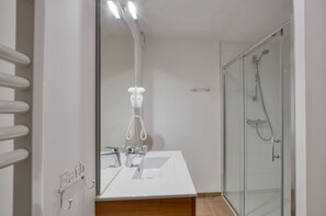 Ducha, secador de pelo