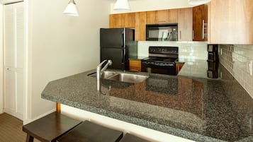 Premium Condos and Townhomes, 3 Bedroom, Kitchen | Private kitchen | Fridge, microwave, coffee/tea maker, electric kettle