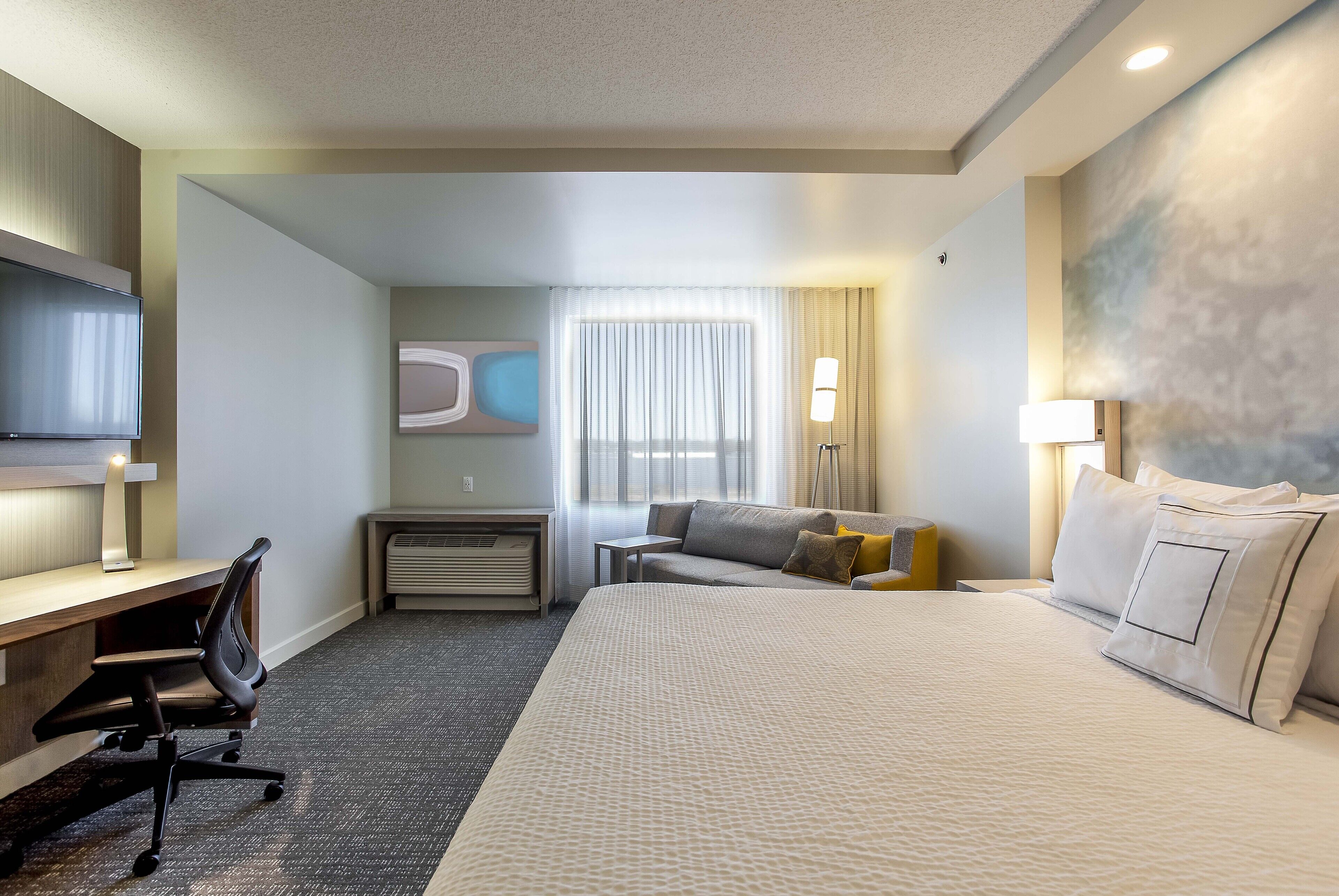 Room, 1 King Bed with Sofa bed | Courtyard view