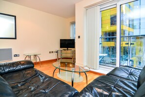 Business Apartment, 2 Bedrooms | Living area | Flat-screen TV