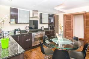 Apartment, 2 Bedrooms | Private kitchen | Full-size fridge, microwave, oven, stovetop