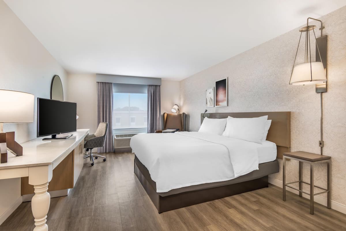 in-room safe, desk, blackout curtains, iron/ironing board