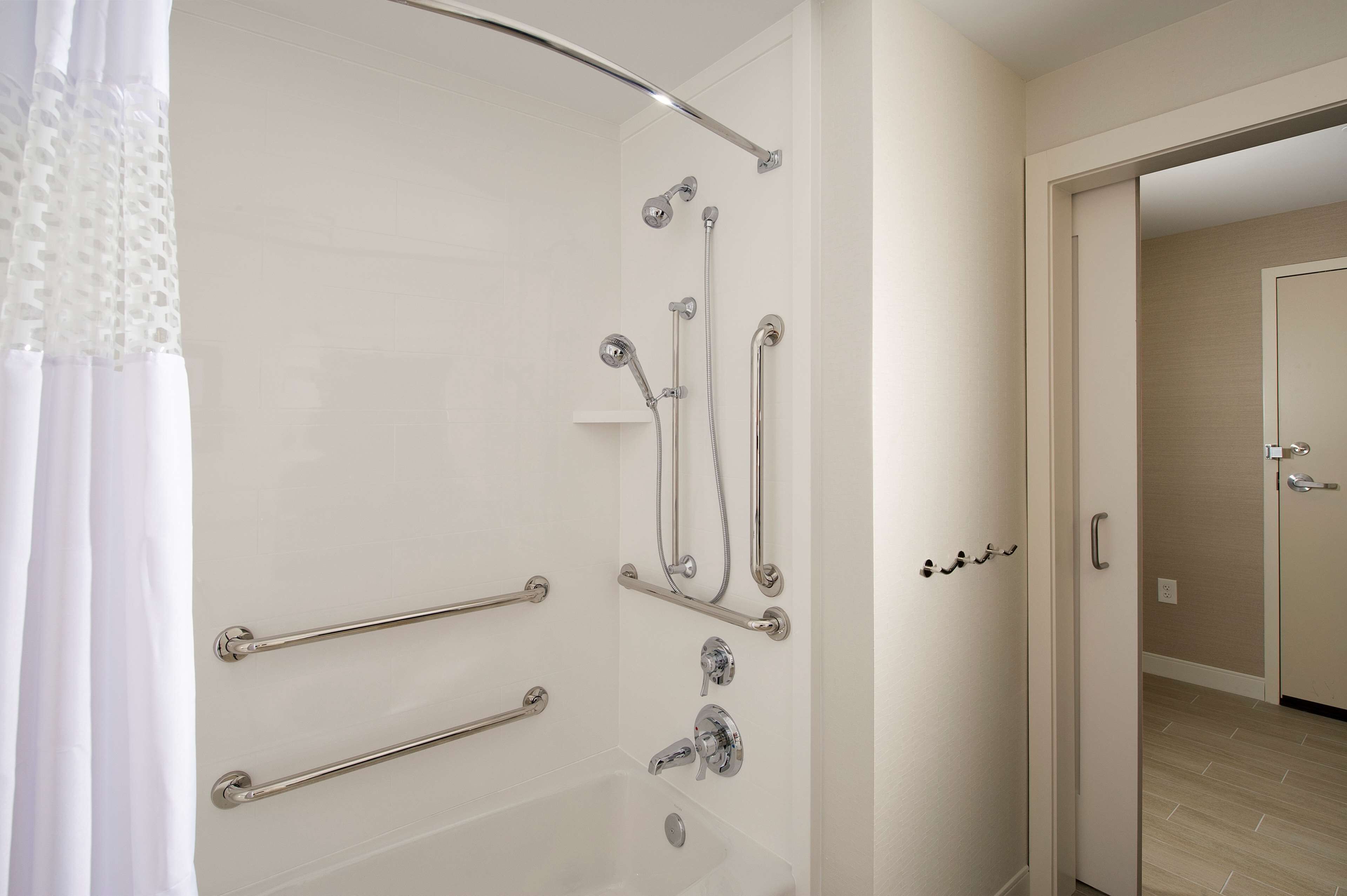 combined shower/bathtub, free toiletries, hair dryer, towels